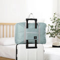 Solid Color Waterproof Folding Travel Bag Lightweight Large Capacity Luggage Bag